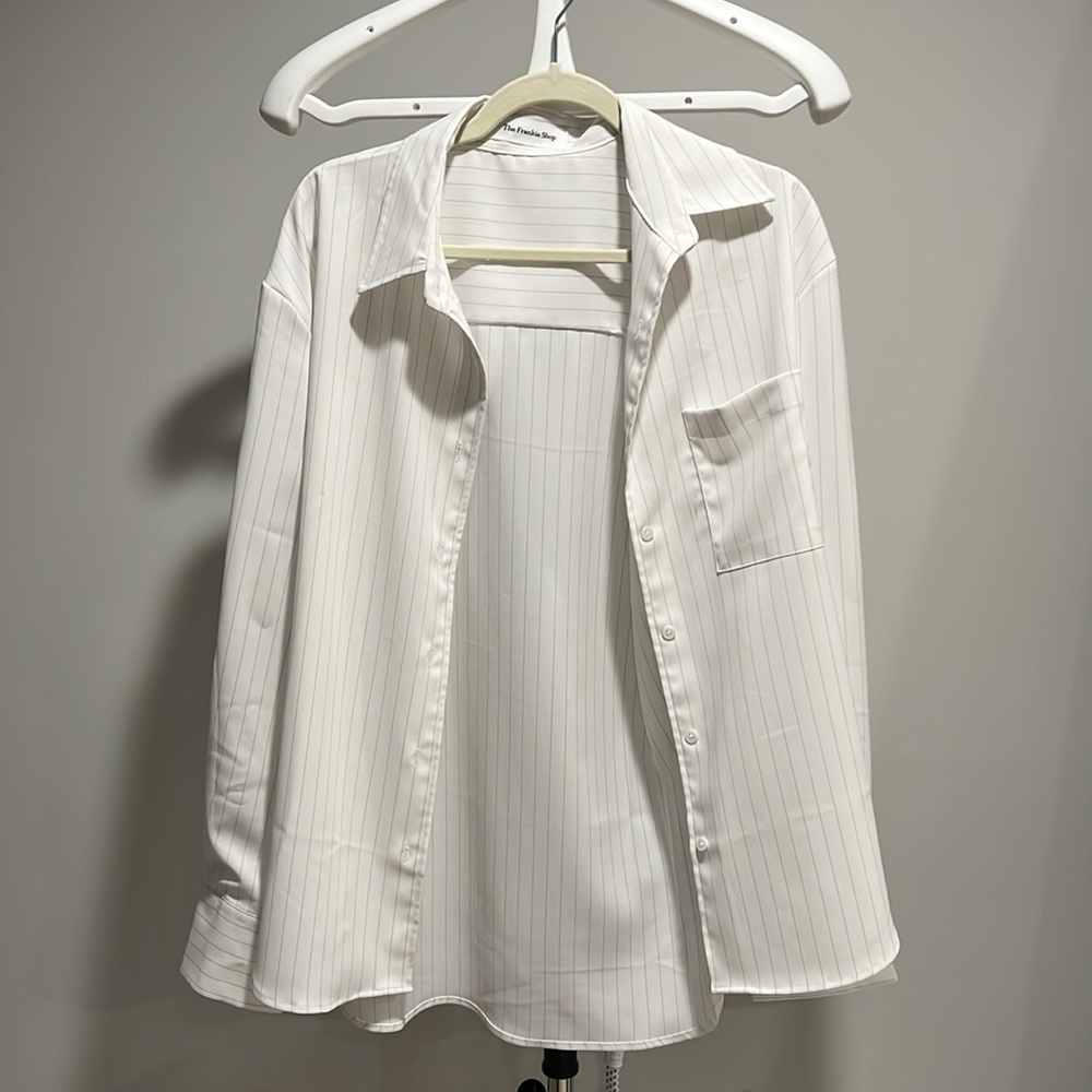 The Frankie shop Lui oversized pinstriped crepe shirt.